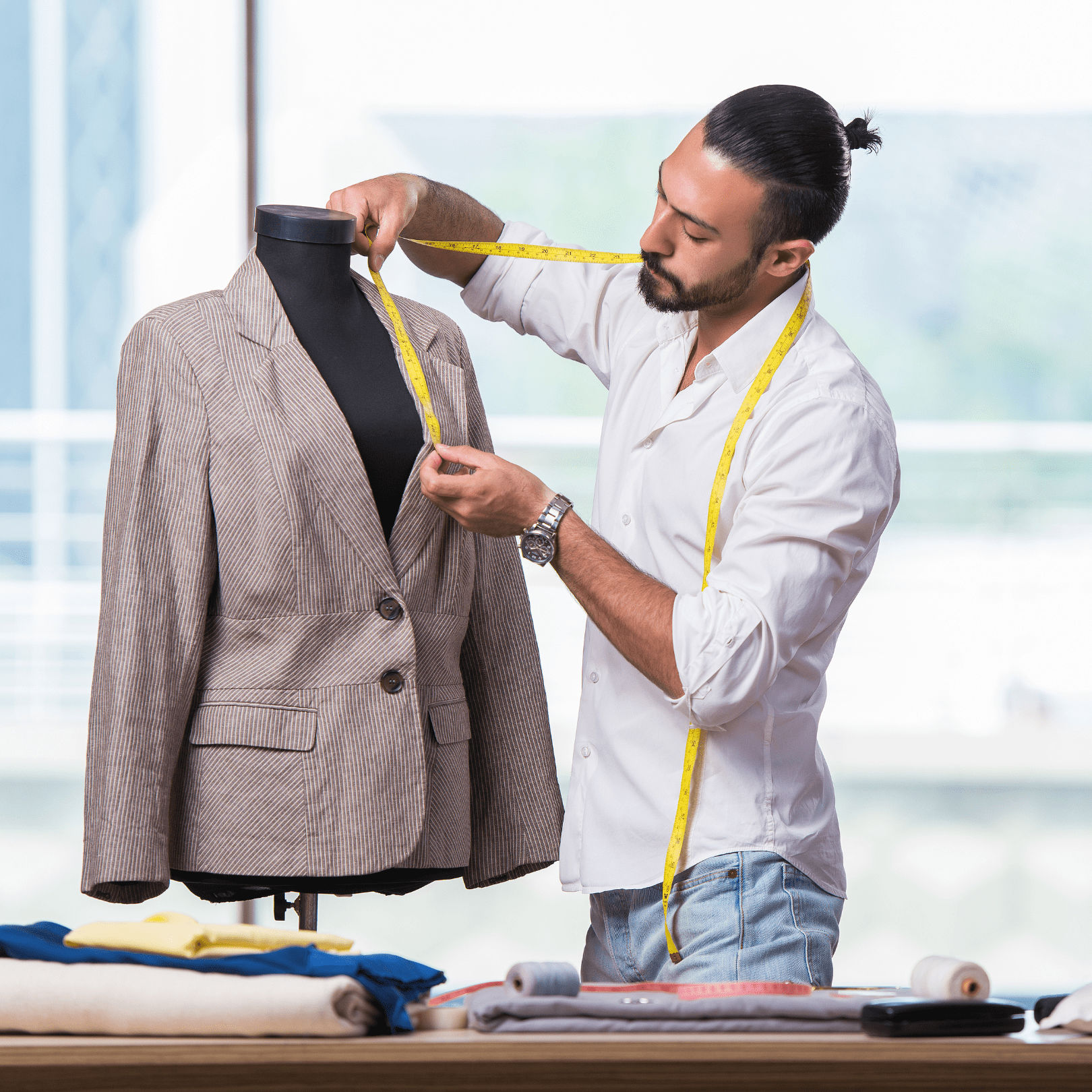 a tailor altering a coat to fit similar to how person may tailor FlexBenefits plans to their needs